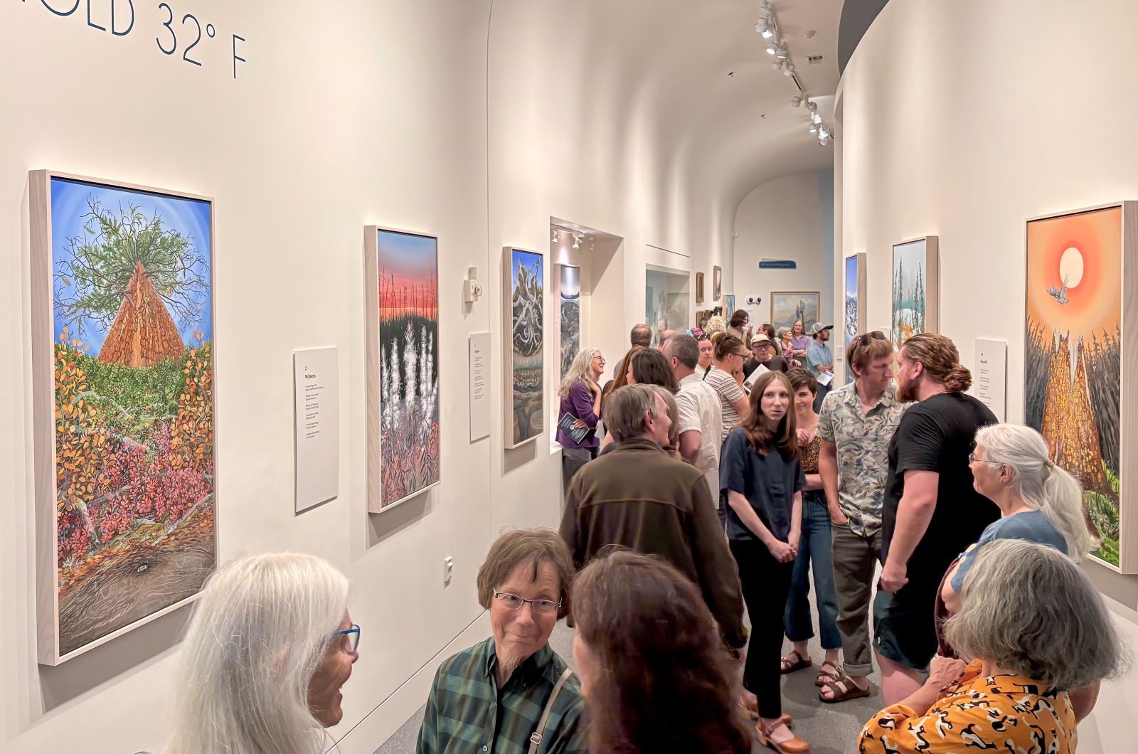 Visitors gather at the opening of the Threshold 32°F art exhibit.  Photo: C. McCaa
